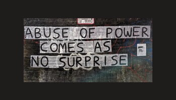 paste-up of Jenny Holzer quote "abuse of power comes as no surprise"