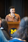 image of Adrian King giving conference presentation